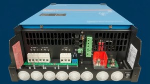 Alt text: Rear AC wiring terminals on a Victron MultiPlus-II inverter/charger, showing AC input and dual AC output connections
